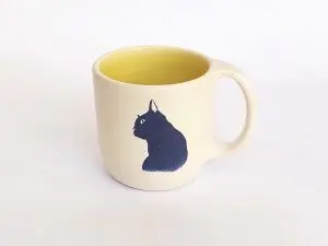 Taza S gato amarillo